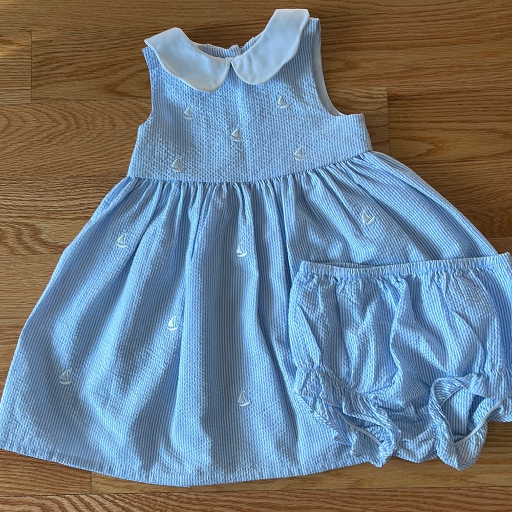 Seersucker with little sailboat embroidery dress comes with matching bloomers.